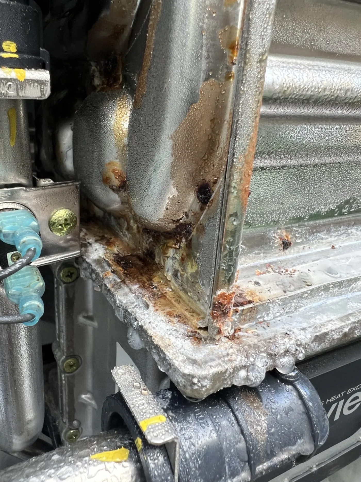 Corroded water heater connection that failed in a Kapolei, HI garage