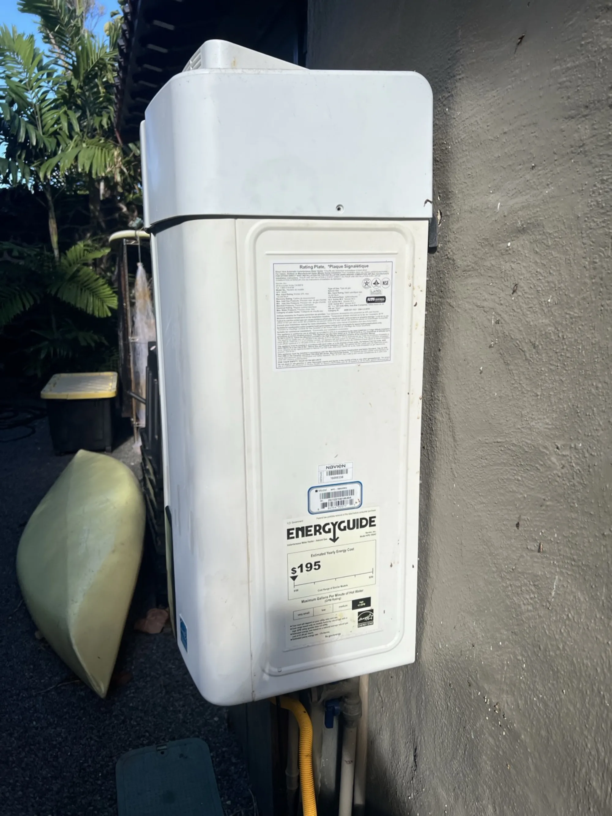 Wall-mounted tankless water heater installed by Shoreline Plumbing in Kapolei, HI